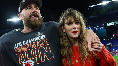 Travis Kelce #87 of the Kansas City Chiefs (L) celebrates with Taylor Swift after defeating the Baltimore Ravens in the AFC Championship Game at M&amp;T Bank Stadium on January 28, 2024