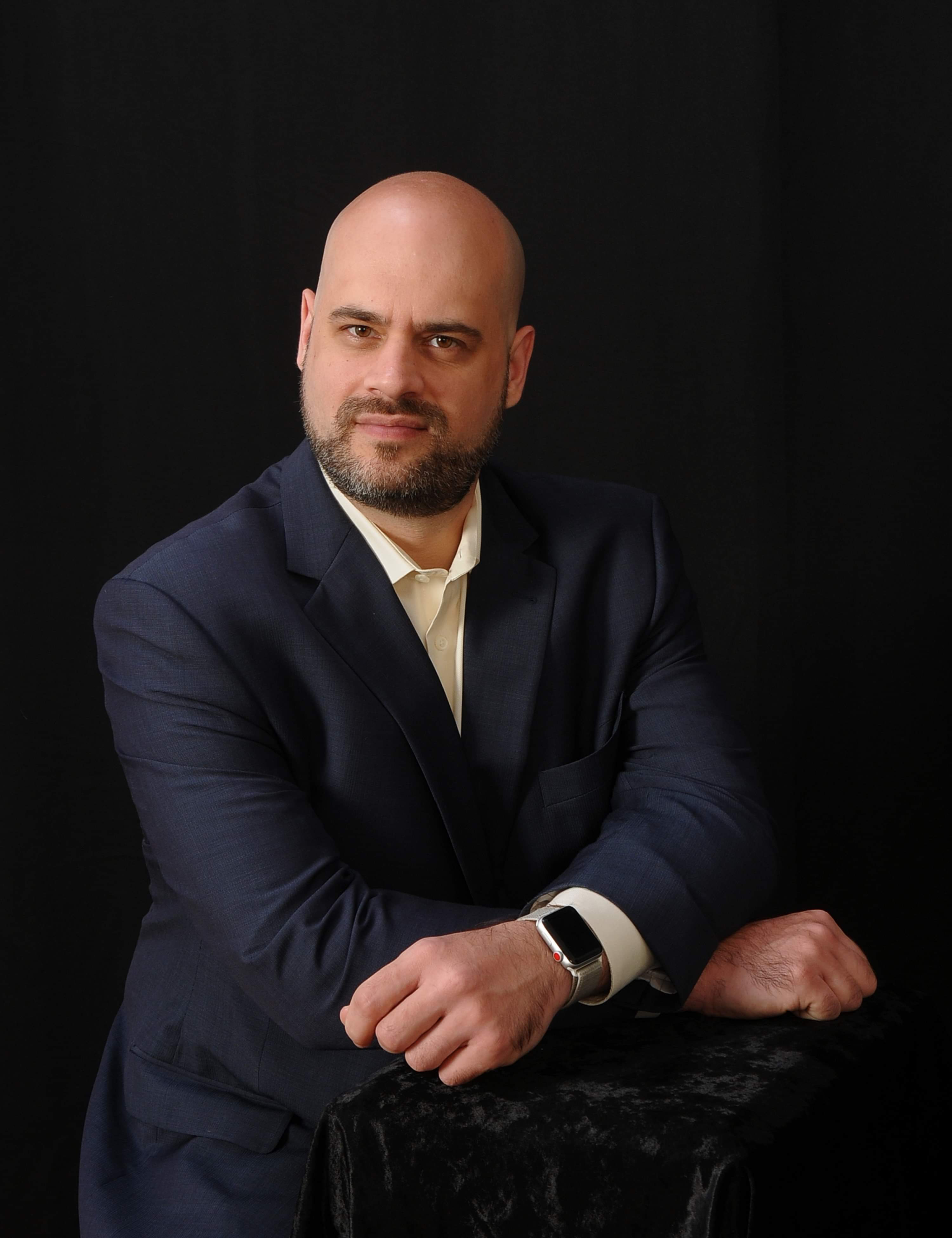 Headshot of Joshua Pressnell.
