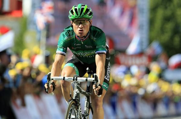 Stage 10 winner Thomas Voeckler (Europcar) crosses the finish line in third place, 12 seconds behind F&eacute;drigo and Vande Velde.