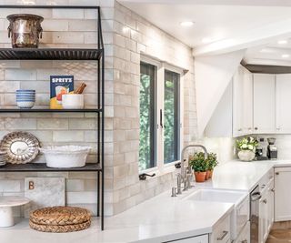 A light kitchen with low ceilings and Benjamin Moore's Cotton Balls paint color on the walls and ceiling