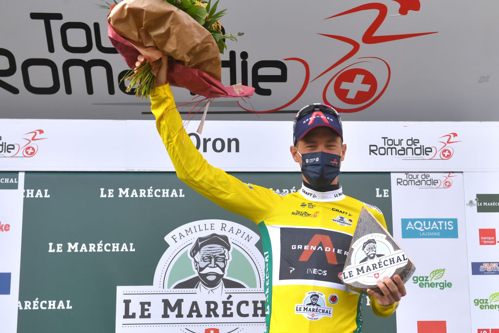 ORON SWITZERLAND APRIL 27 Rohan Dennis of Australia and Team INEOS Grenadiers Yellow Leader Jersey celebrates at podium during the 74th Tour De Romandie 2021 Prologue a 405km Individual Time Trial stage from Oron to Oron 700m Cheese Trophy Mask Covid Safety Measures ITT TDR2021 TDRnonstop UCIworldtour on April 27 2021 in Oron Switzerland Photo by Luc ClaessenGetty Images