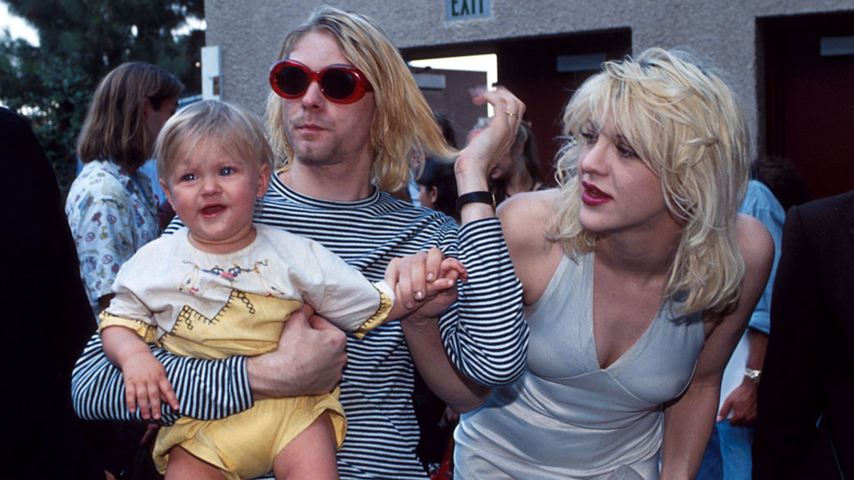 Kurt Cobain of Nirvana with wife Courtney Love and daughter Frances Bean Cobain