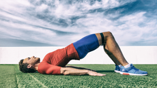 Man doing a bodyweight glute bridge