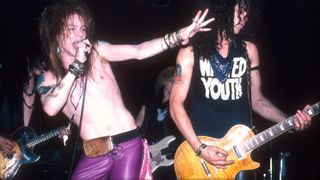 Axl Rose and Slash of Guns N' Roses in concert circa 1987