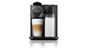 Nespresso coffee machine that's just poured a milk based coffee