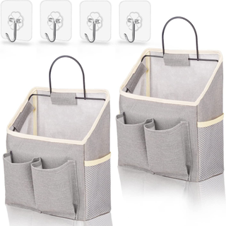 Two grey hanging storage bags with self-adhesive hooks.