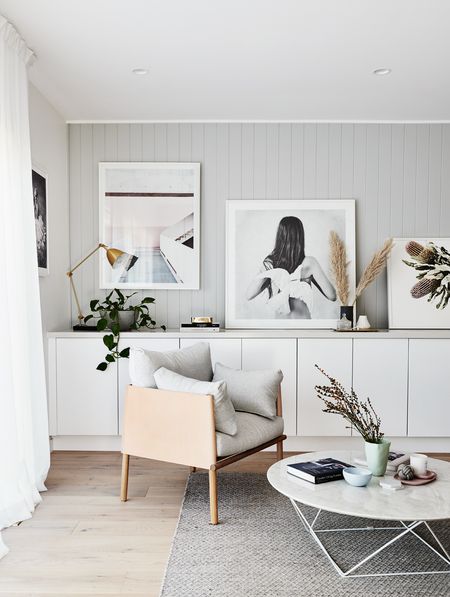 Light grey living room with marble coffee table