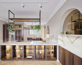 Modern kitchen with above island storage unit