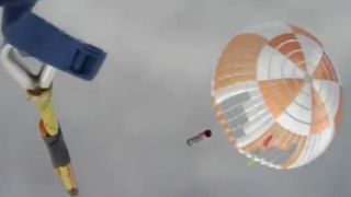 Parachute with rocket underneath