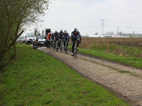 Team Saxo Bank gets a paceline going on the cobbles.
