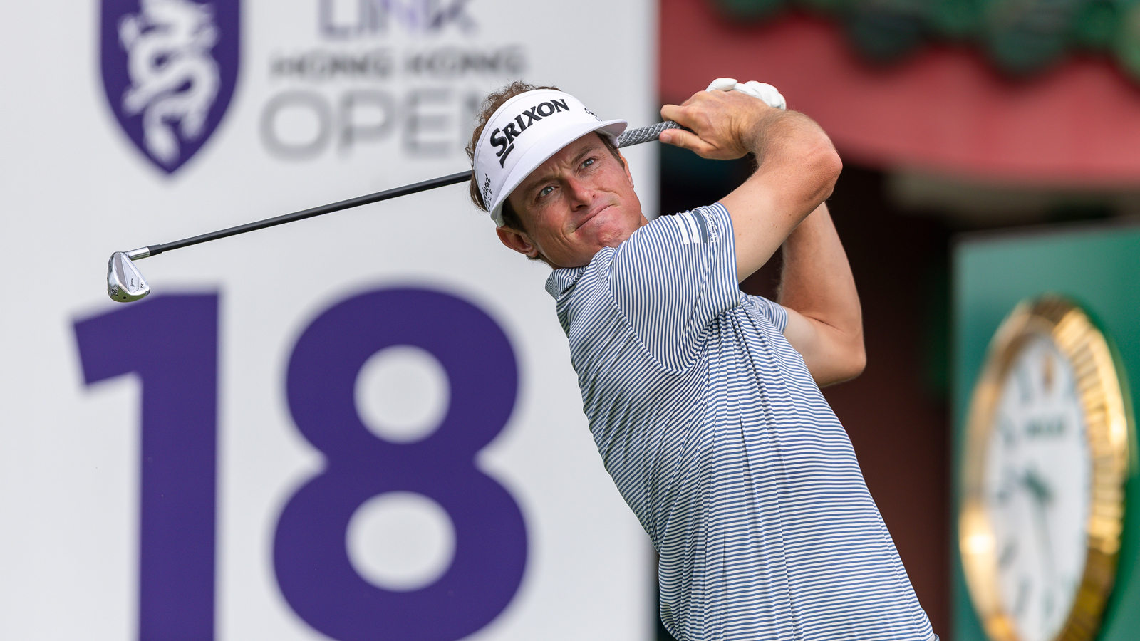 MJ Maguire hits an iron off the tee