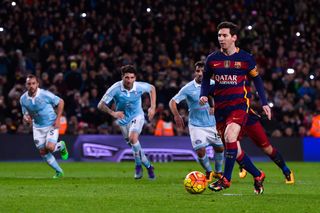 Lionel Messi lays the ball off to Luis Suarez from the penalty spot as Barcelona bear Celta Vigo 6-1 at Camp Nou in February 2016.