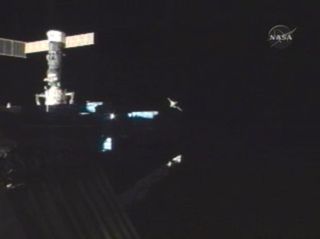 A Russian cargo ship drifts from the International Space Station after undocking in 2007. NASA has sent out a call for U.S. companies to develop a new and improved way to deal with trash in space for future, deep-space missions.
