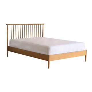 A wooden spindle back bed frame 