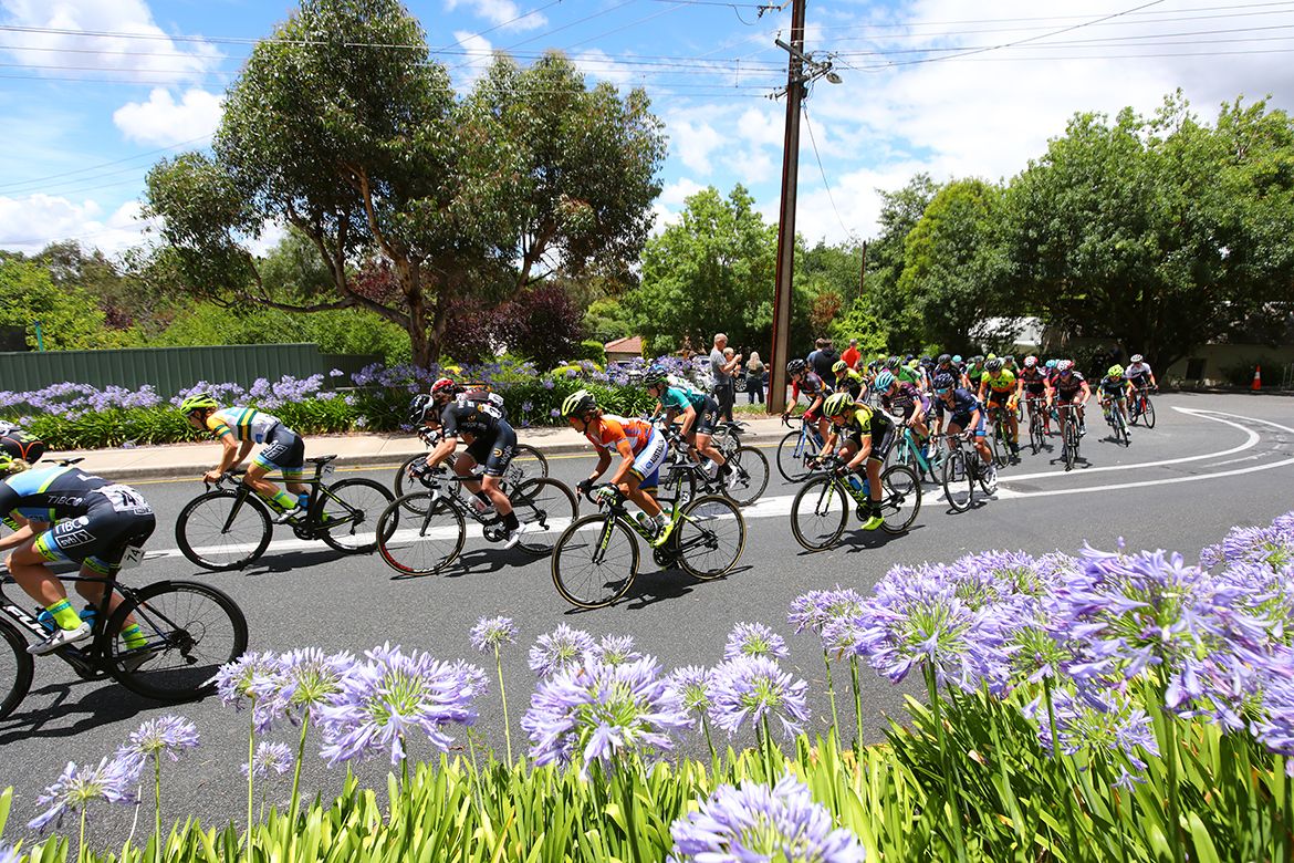 Ochre jersey holder Katrin Garfoot on the outside of the bunch