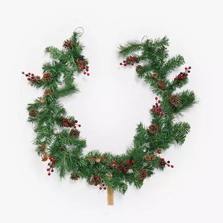 Christmas garland with pine and berries
