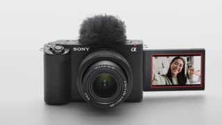 Sony ZV-E1 full-frame vlog camera with face on screen at side