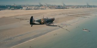 A British plane flying over the beach in Dunkirk