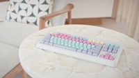 Promotional photo of a Norbauer mechanical keyboard on a table