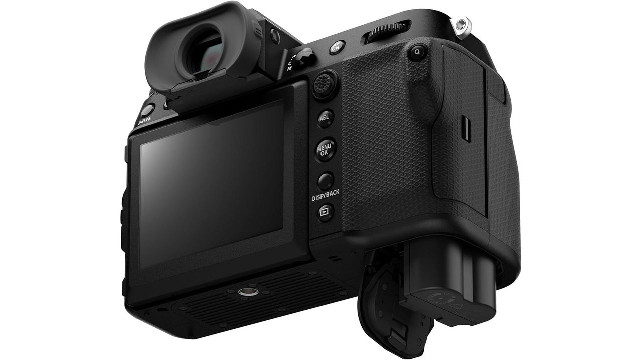 The Fujifilm GFX100S II showing the battery and open battery compartment