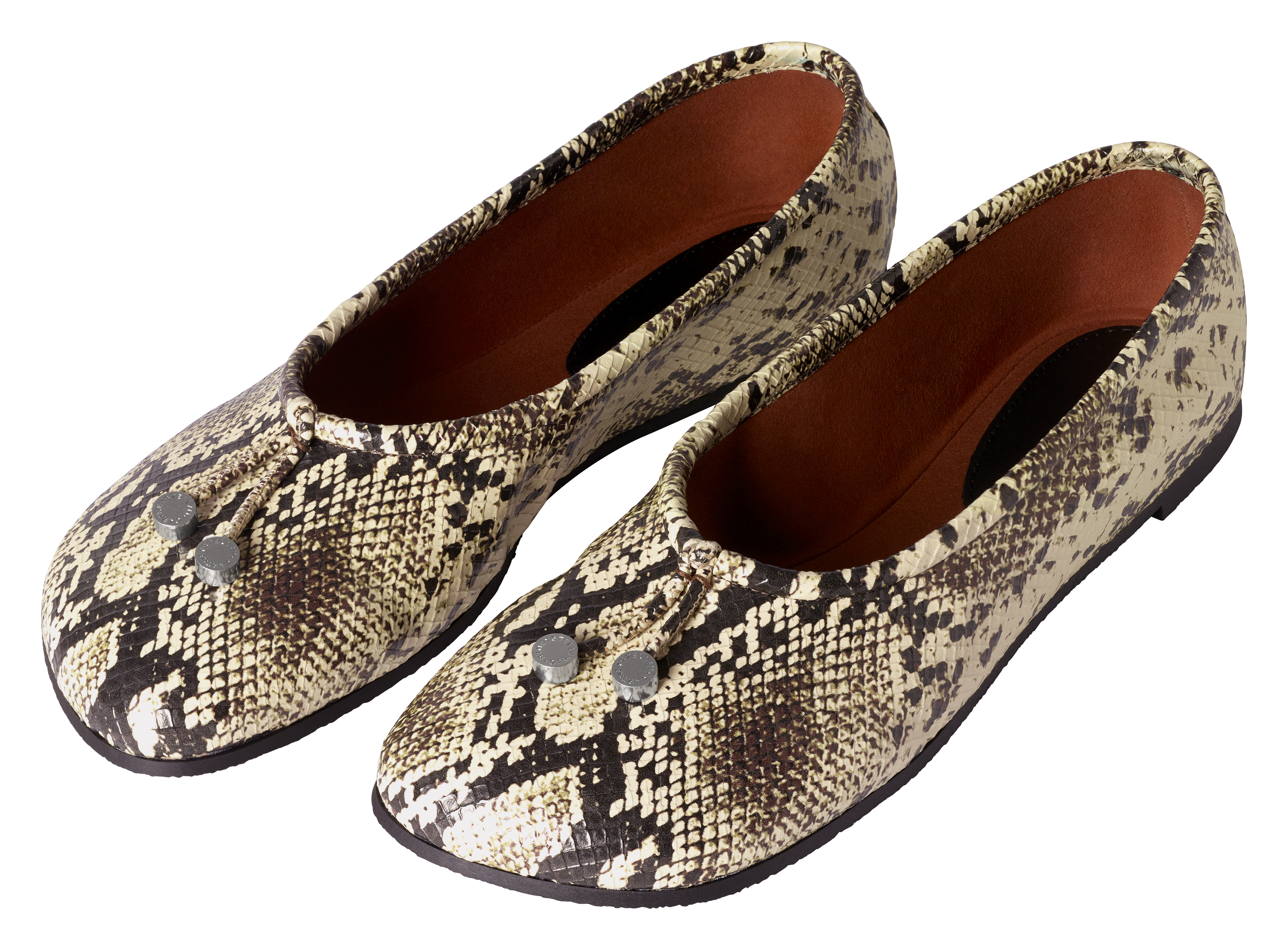 clothes from the H&M x Stella McCartney collaboration on a plain backdrop