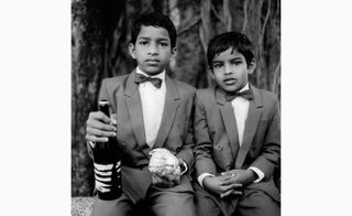 Brothers at the local feast in Loutolim, Goa