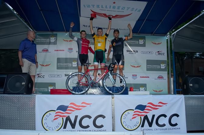 Peter Olejniczak (St Paul Bicycle Racing Club) stands on the top step of the podium