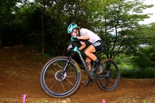 IZU JAPAN JULY 27 Kate Courtney of Team United States rides during the Womens Crosscountry race on day four of the Tokyo 2020 Olympic Games at Izu Mountain Bike Course on July 27 2021 in Izu Shizuoka Japan Photo by Tim de WaeleGetty Images