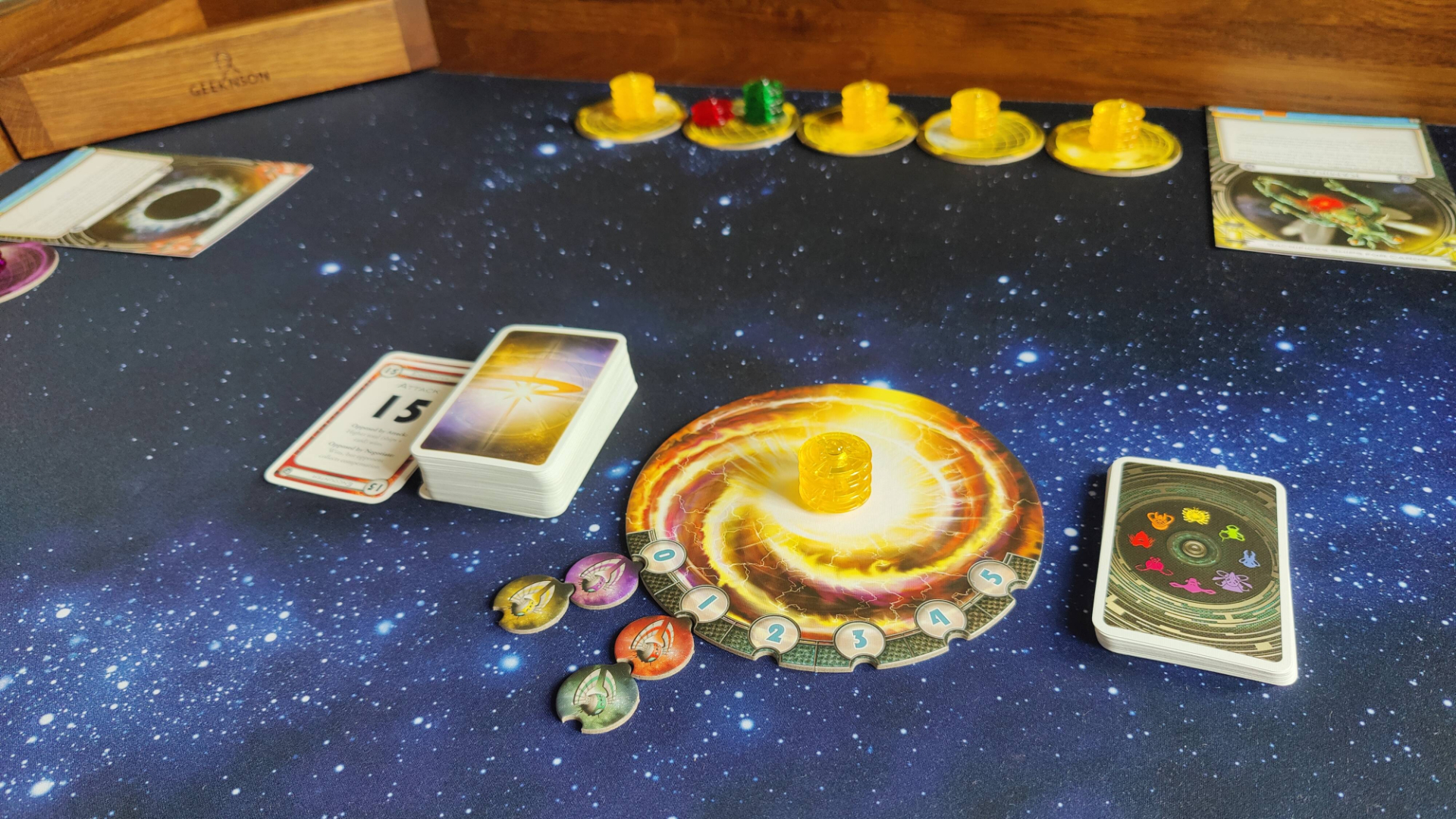 Red and green both move one step up on the colony tracker - Cosmic Encounter.