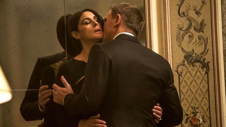 Coat, Suit, Outerwear, Formal wear, Dress, Interaction, Romance, Gesture, Love, Conversation,