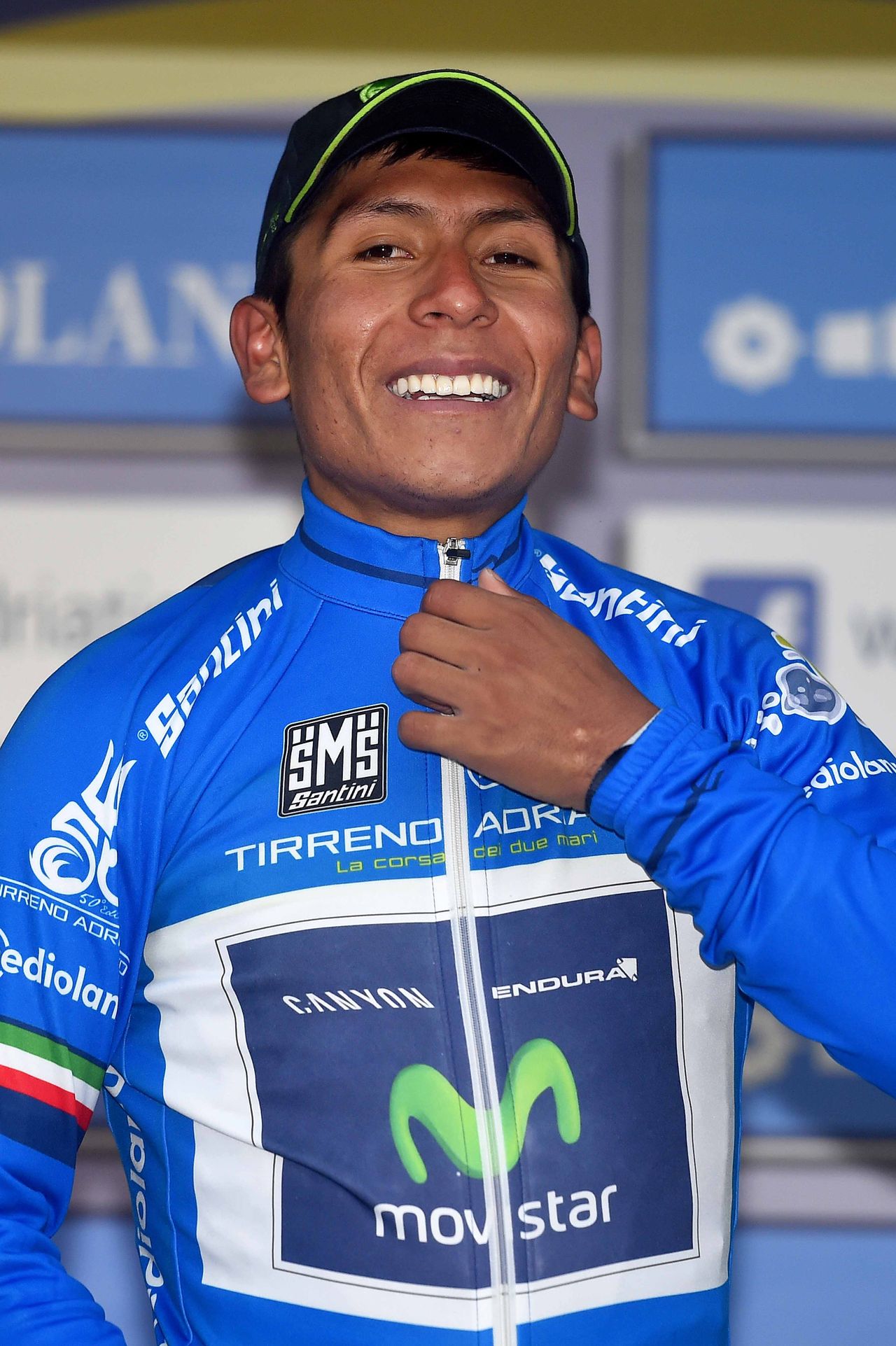 Nario Quintana (Movistar) was all smiles when pulling on the race leader's blue jersey