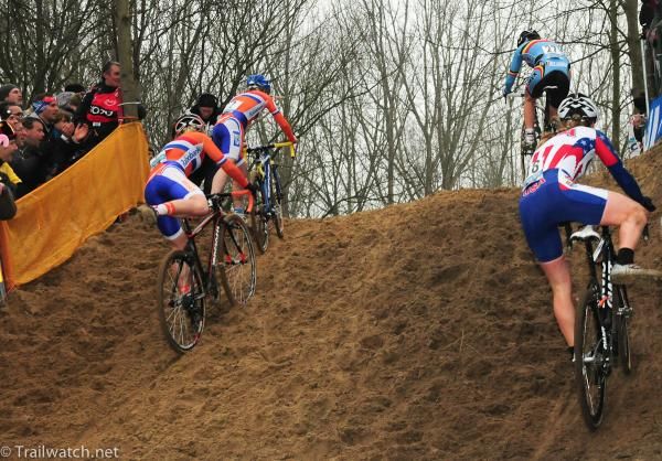 The contenders for second place watch Sanne Cant (Belgium) ride away on the last lap