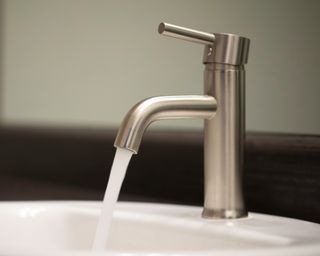 Bathroom faucet with water running