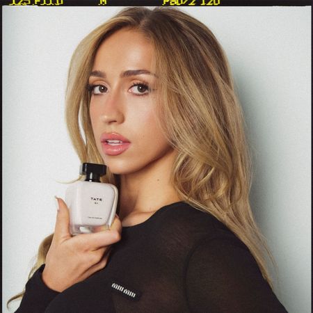 Photo of Tate McRae and her new fragrance for Who What Wear 