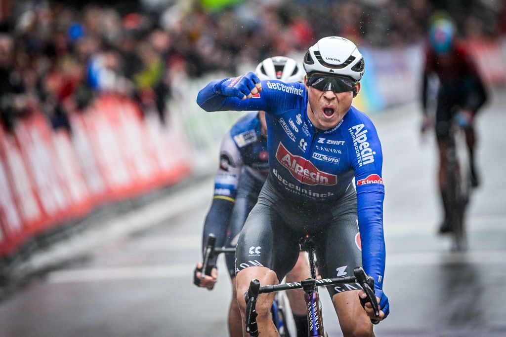 AlpecinDeceunincks Belgian rider Jasper Philipsen celebrates after crossing the finish line to win the mens elite race of the Classic BruggeDe Panne oneday cycling race 2074km from Brugge to De Panne on March 22 2023 Photo by ERIC LALMAND Belga AFP Belgium OUT Photo by ERIC LALMANDBelgaAFP via Getty Images