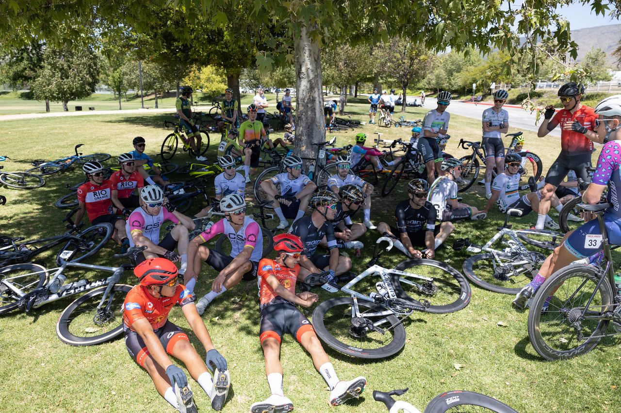 Some of the riders in the men's field found a shady spot to recover during their 32 minute "Intermission" with 2 laps to go.