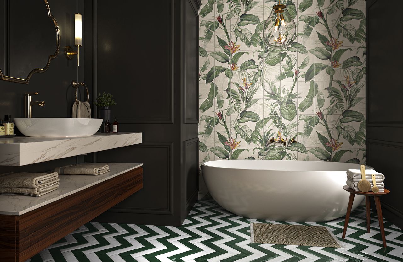 A bathroom tiled in botanical mural tiles 