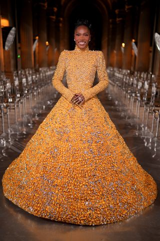 Doechii attends the "Le Grand Diner du Louvre" Passage Richelieu Photocall at Musee du Louvre on March 04, 2025 in Paris, France.