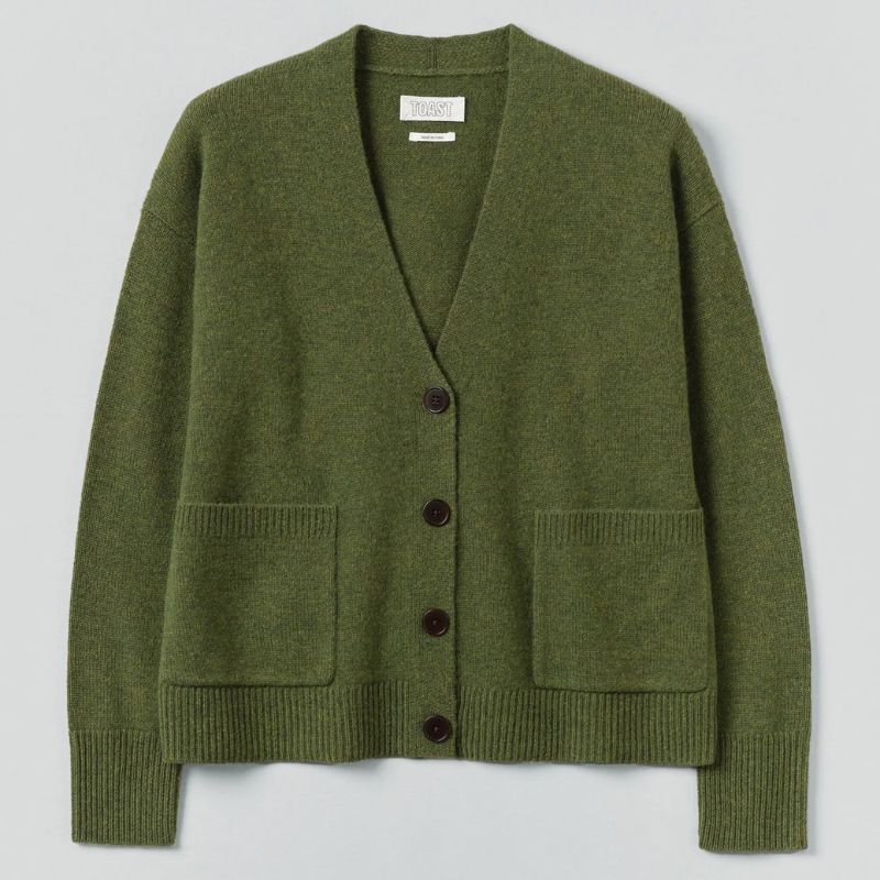 A cutout shot of a khaki cardigan by Toast