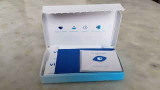 Image shows the box containing GlassesUSA.com Vista plus contact lenses