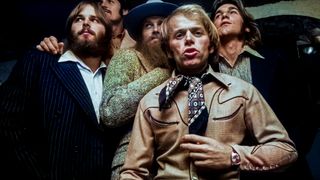 The Beach Boys posed backstage at Top Of The Pops in London on 18th November 1970. Left to Right: Carl Wilson, Bruce Johnston, Mike Love, Al Jardine, Dennis Wilson. 
