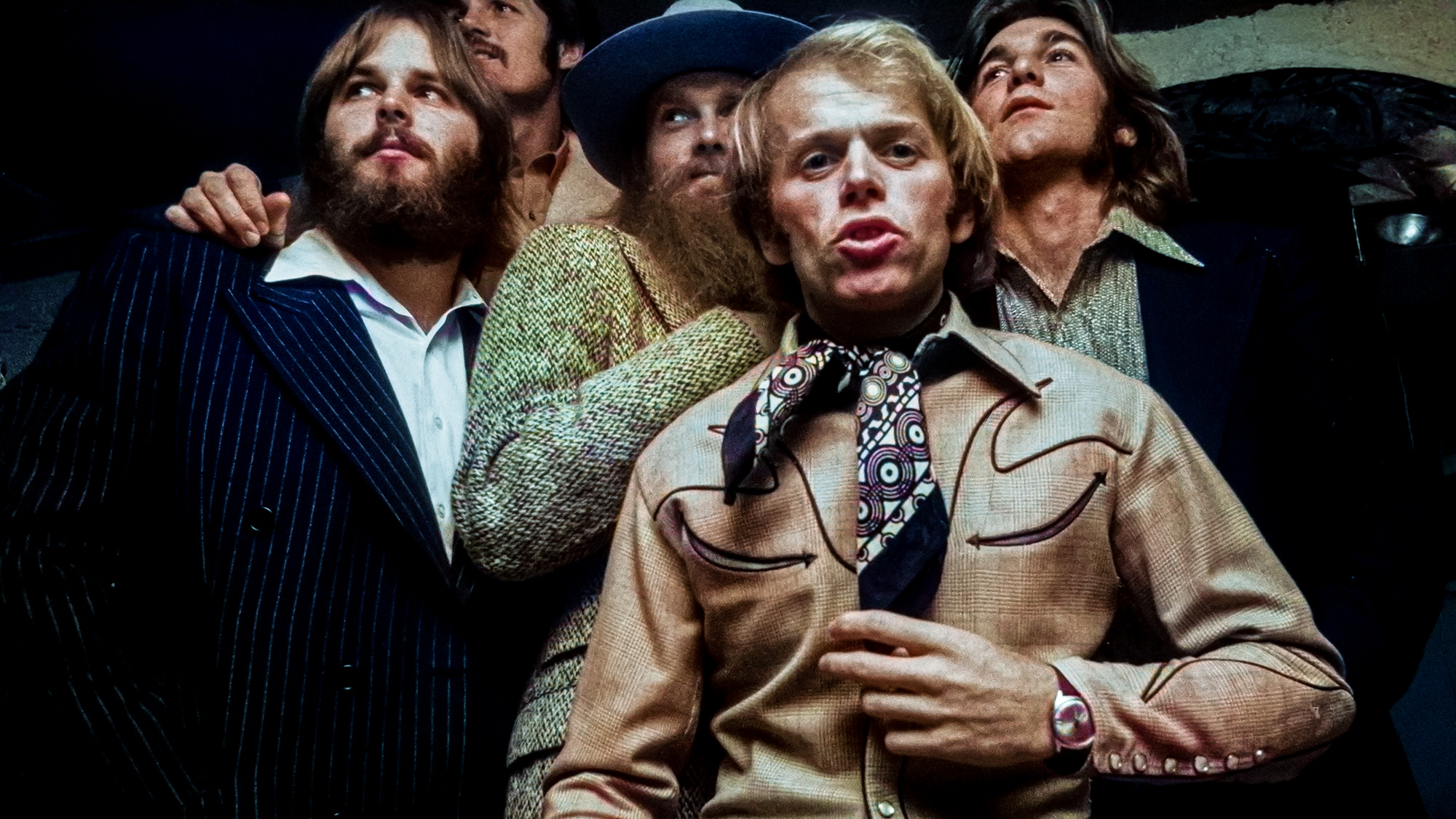 The Beach Boys posed backstage at Top Of The Pops in London on 18th November 1970. Left to Right: Carl Wilson, Bruce Johnston, Mike Love, Al Jardine, Dennis Wilson. 