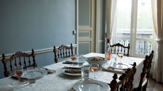 A picture of a dining room table in the French countryside style