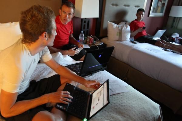 Chad Beyer, left, Alexander Kristoff, center, and Jackson Stewart consume bandwidth post-stage.