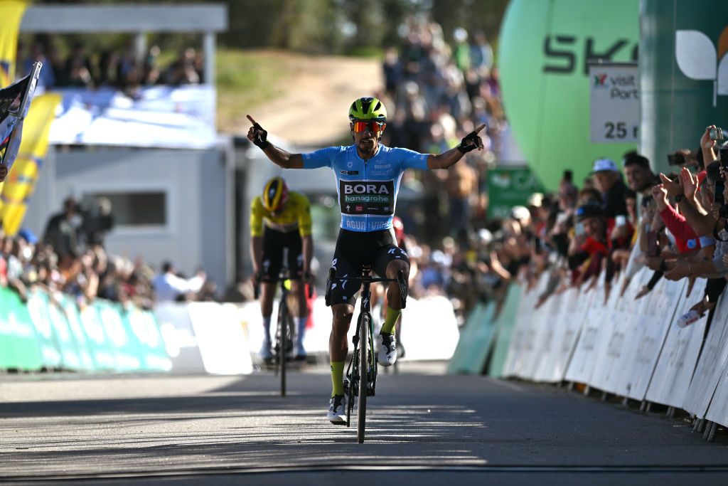ALTO DO MALHAO PORTUGAL FEBRUARY 18 Daniel Felipe Martinez of Colombia and Team BORA hansgrohe Blue Mountain Jersey celebrates at finish line as stage winner during the 50th Volta ao Algarve em Bicicleta 2024 Stage 5 a 1658km stage from Faro to Alto do Malhao 514m on February 18 2024 in Alto do Malhao Portugal Photo by Dario BelingheriGetty Images