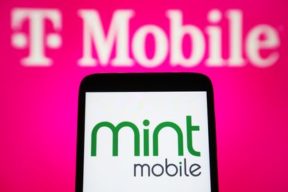A smartphone with the Mint Mobile logo in front of a T-Mobile logo.