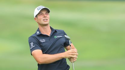 Viktor Hovland watches his second shot on the second hole during the Travelers Championship.