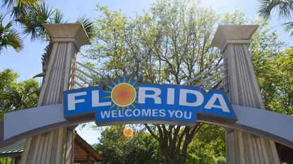 Florida Welcome You sign on archway