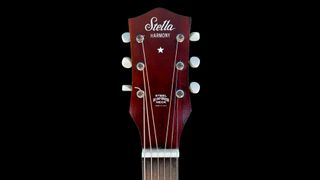 The headstock of a Stella Harmony guitar