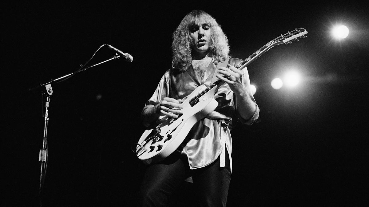 Alex Lifeson, guitarist with Canadian rock band Rush, playing the guitar during a live concert performance by the band at the Gaumont, in Southampton, Hampshire, England, United Kingdom, 13 May 1979
